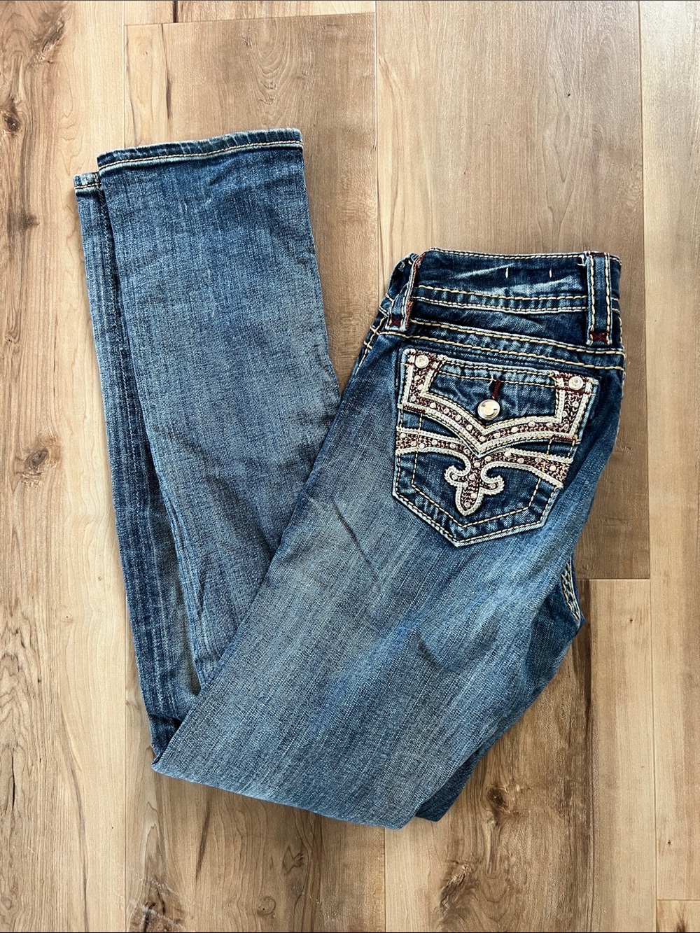 Rock Revival Women’s Medium Blue Skinny Jeans with Embellished Pocket